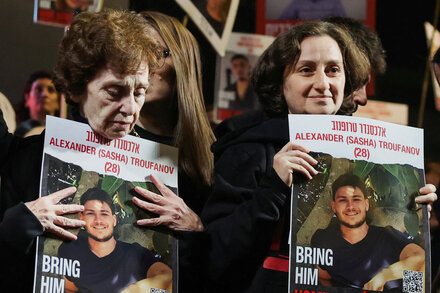 Released hostages give Tel Aviv protesters hope for those left behind.
