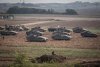Poised for Attack, Israel Steps Up Calls for Gaza Residents to Leave ‘Battle Zone’