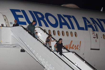 Flight carrying Americans lands in Florida in evacuation DeSantis approved.