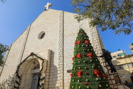 Catholic officials say an Israeli sniper killed a mother and daughter at a Gaza church.