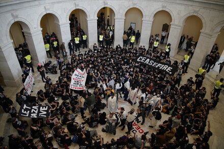 About 300 protesters pleading for a cease-fire were arrested on Capitol Hill, organizers say.