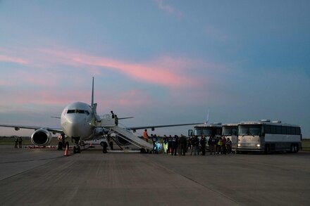 First Venezuelans Sent Back Under New U.S. Policy Arrive in Caracas
