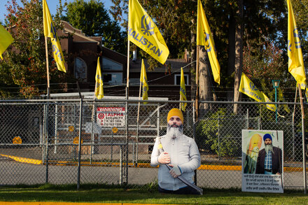 Two Hooded Gunmen, a Silver Getaway Car and a Slain Sikh Leader