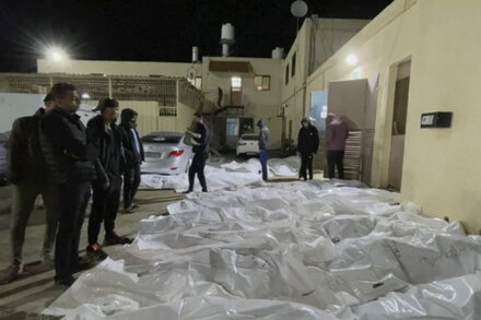 Gazan health officials say attacks leave dozens dead in crowded neighborhood.